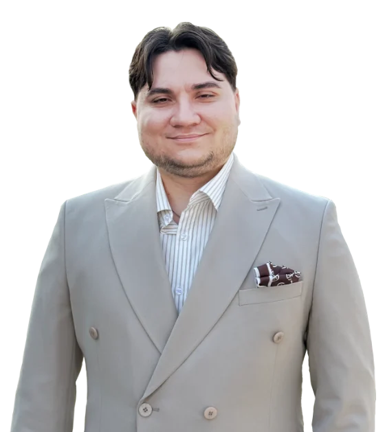 Mike, the course author, in a light double-breasted suit